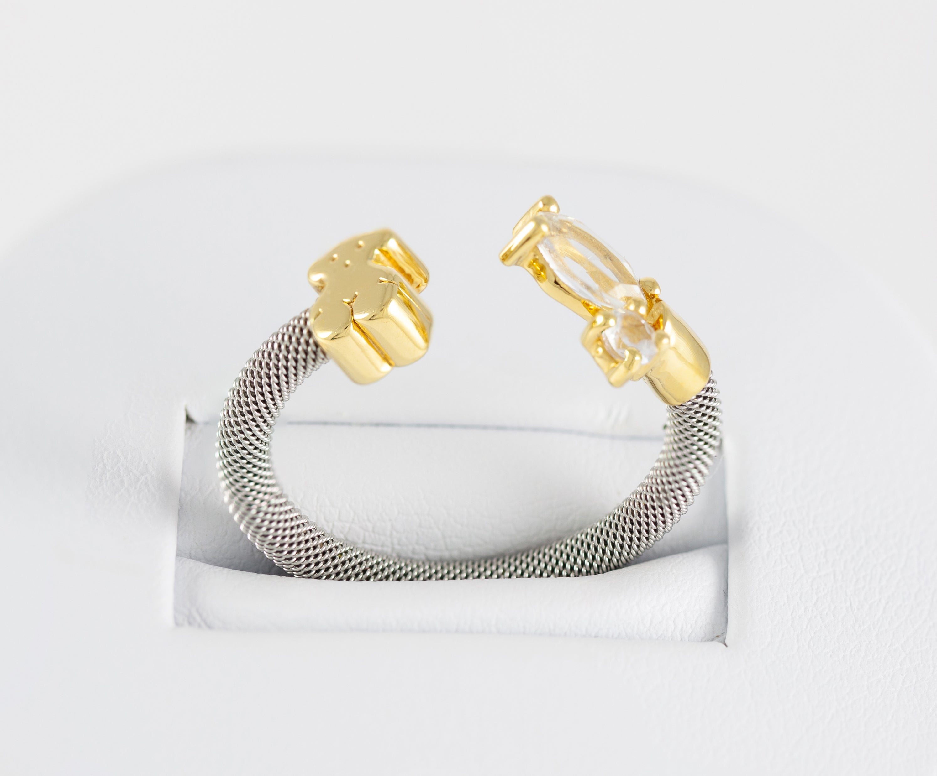 Anillo Tous Eklat en acero y oro amarillo de 18k con dos topacios blancos