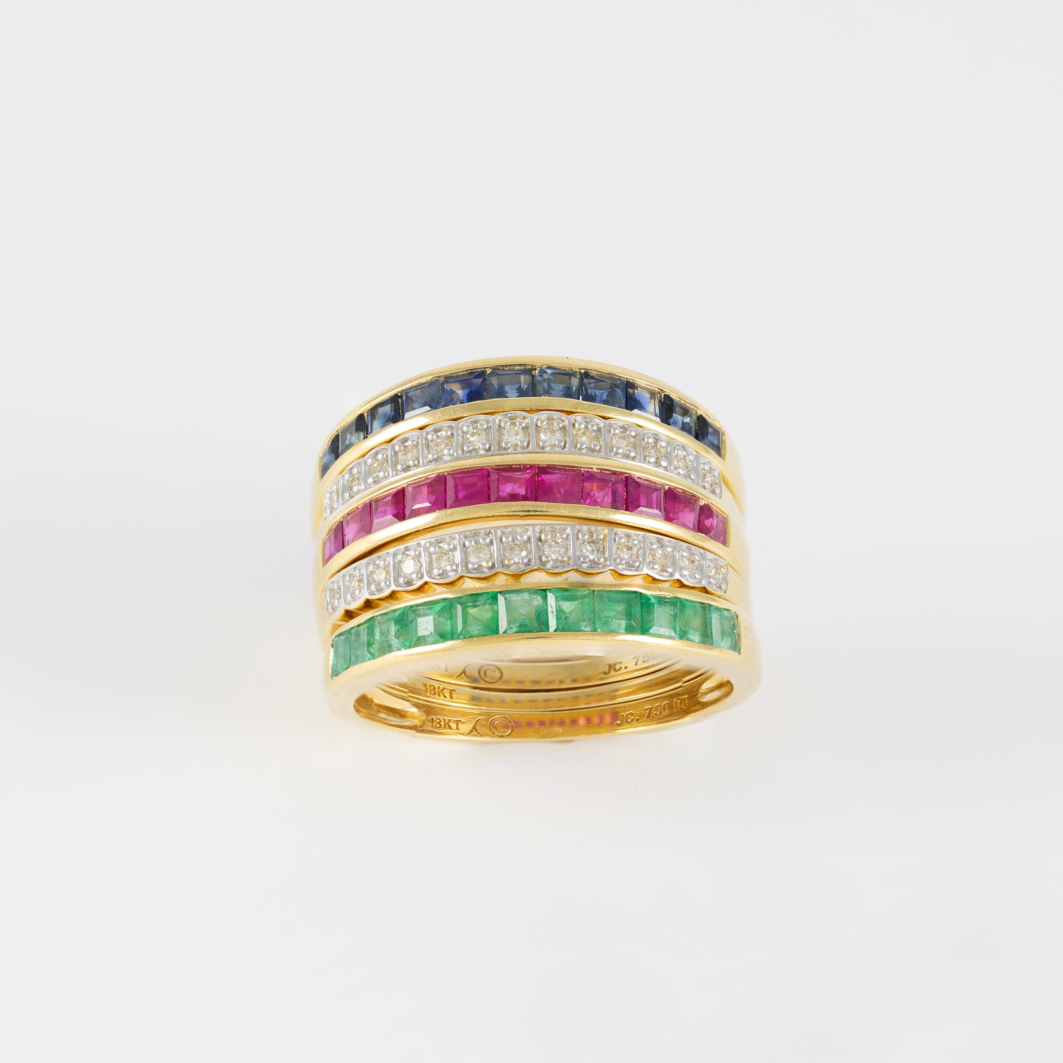 Anillo Infinity en oro amarillo 18k con diamantes zafiros rubíes y esmeraldas