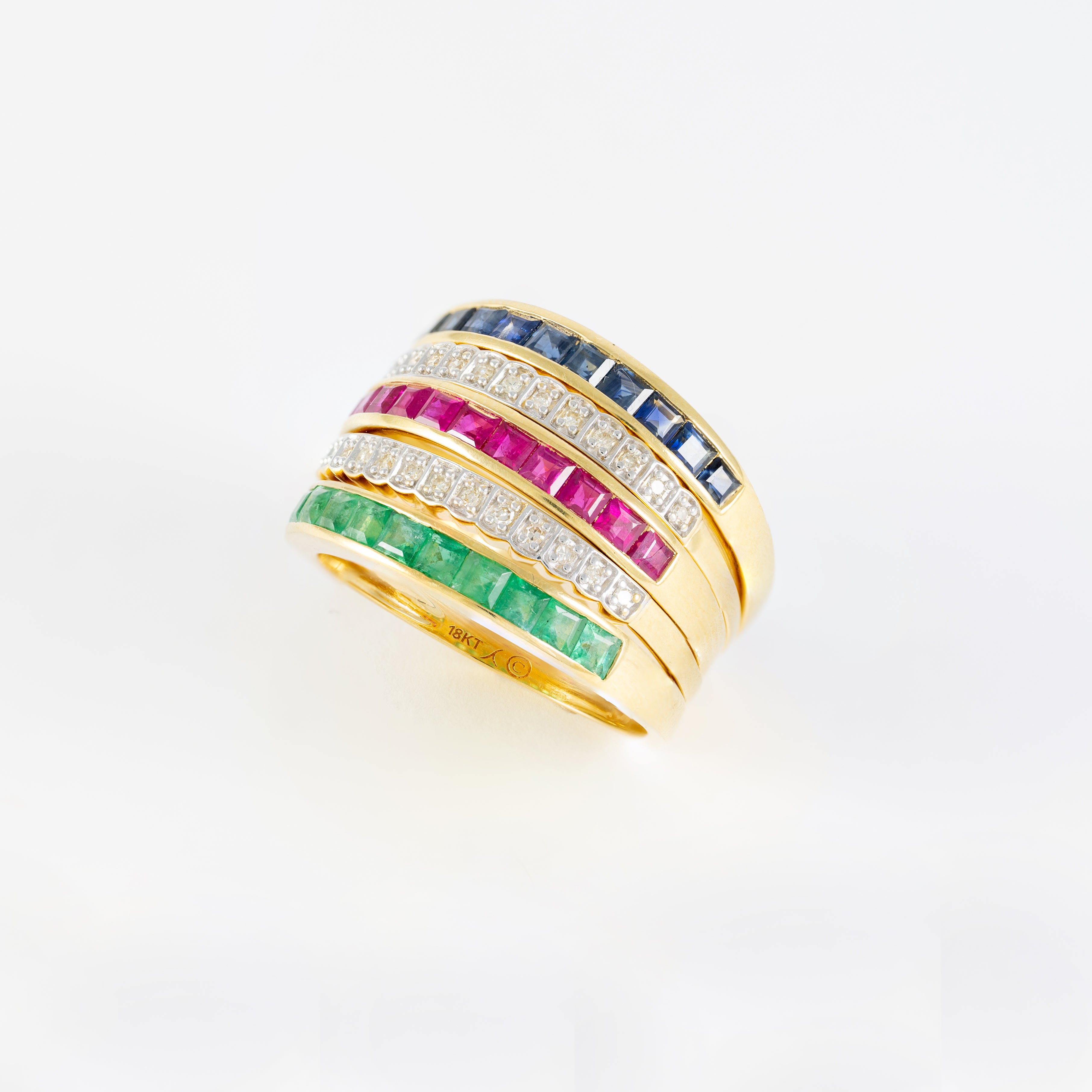 Anillo Infinity en oro amarillo 18k con diamantes zafiros rubíes y esmeraldas