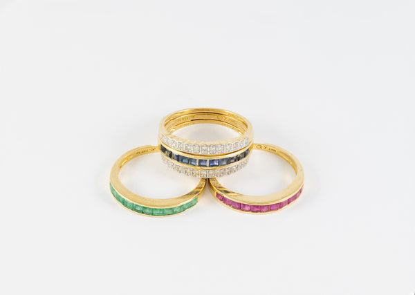 Anillo Infinity en oro amarillo 18k con diamantes zafiros rubíes y esmeraldas