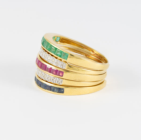 Anillo Infinity en oro amarillo 18k con diamantes zafiros rubíes y esmeraldas