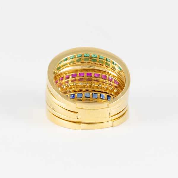 Anillo Infinity en oro amarillo 18k con diamantes zafiros rubíes y esmeraldas