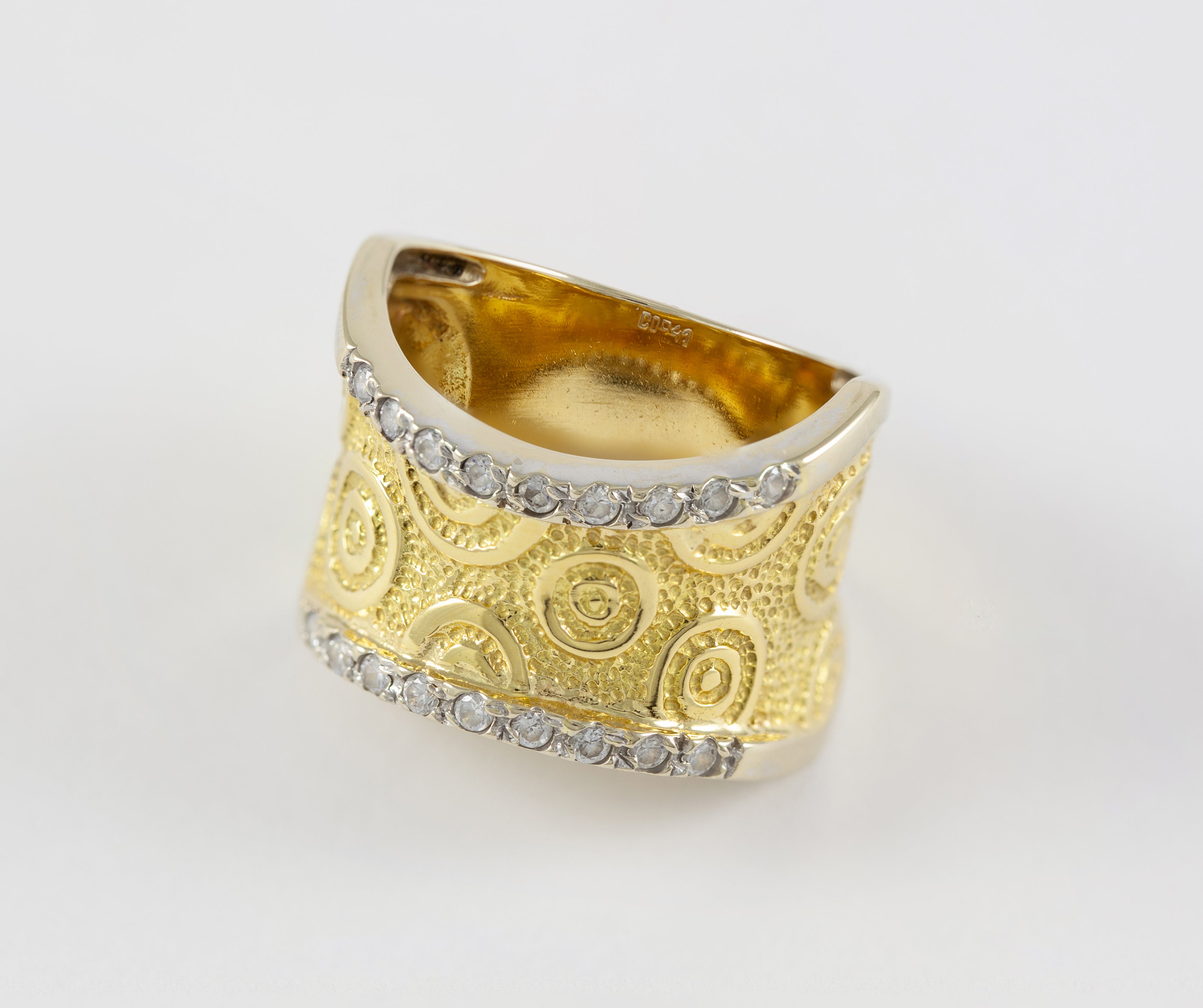Anillo en oro amarillo y blanco 18k con brillantes