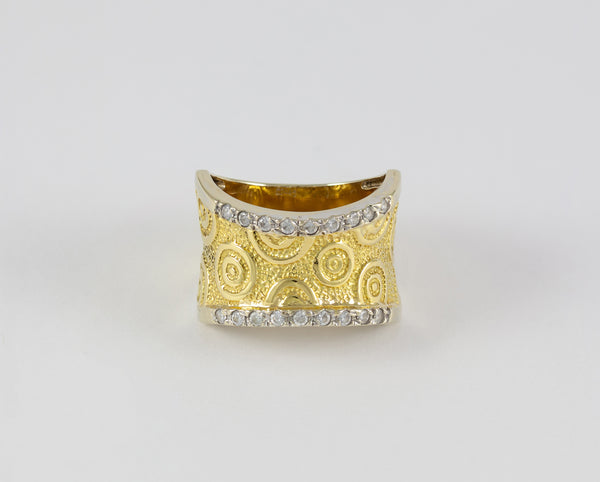 Anillo en oro amarillo y blanco 18k con brillantes