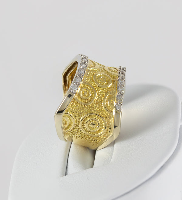Anillo en oro amarillo y blanco 18k con brillantes