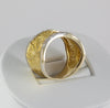Anillo en oro amarillo y blanco 18k con brillantes