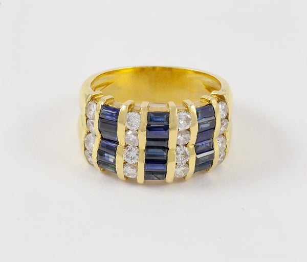 Anillo en oro amarillo 18k con brillantes y zafiros