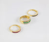 Anillo Infinity en oro amarillo 18k con diamantes zafiros rubíes y esmeraldas