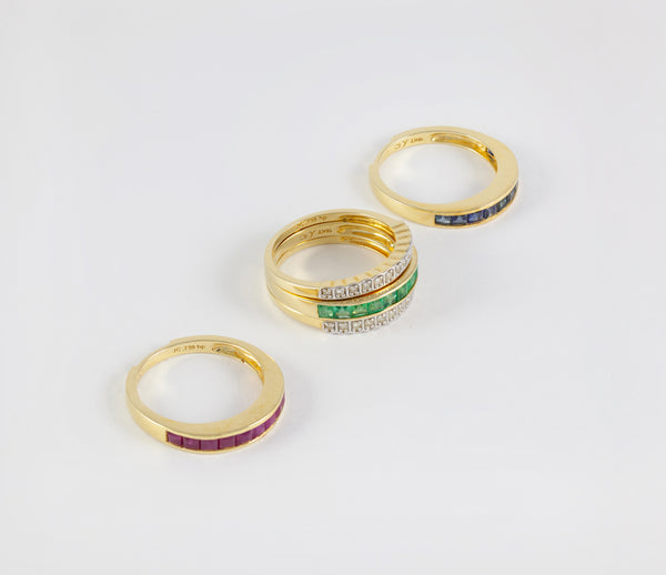 Anillo Infinity en oro amarillo 18k con diamantes zafiros rubíes y esmeraldas