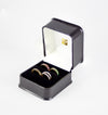 Anillo Infinity en oro amarillo 18k con diamantes zafiros rubíes y esmeraldas