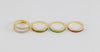 Anillo Infinity en oro amarillo 18k con diamantes zafiros rubíes y esmeraldas