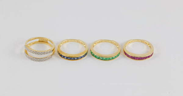 Anillo Infinity en oro amarillo 18k con diamantes zafiros rubíes y esmeraldas