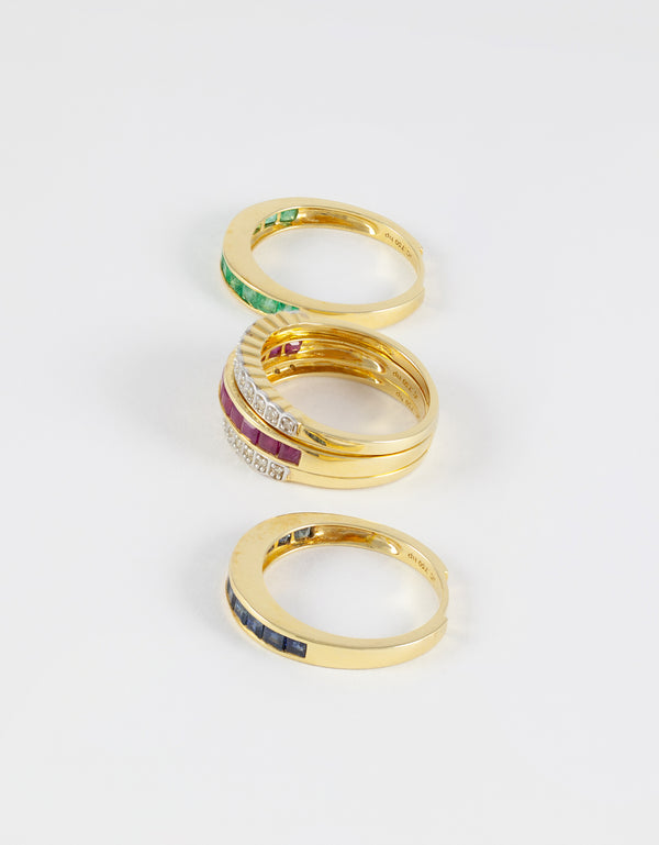 Anillo Infinity en oro amarillo 18k con diamantes zafiros rubíes y esmeraldas