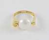Anillo en oro amarillo 18k y perla