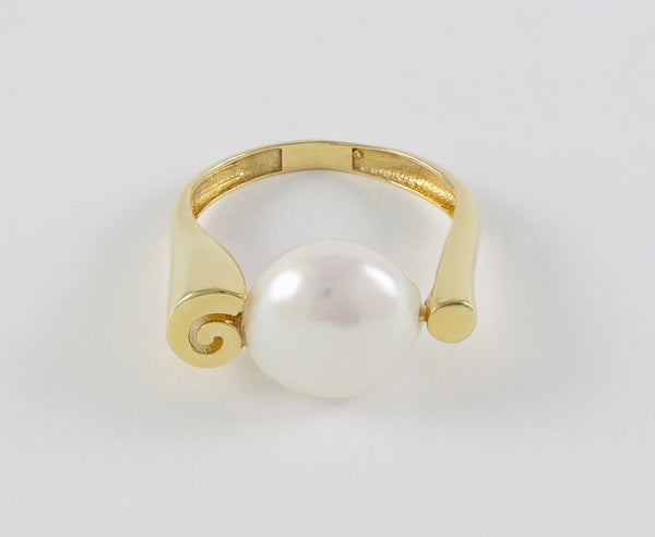 Anillo en oro amarillo 18k y perla