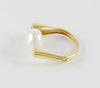 Anillo en oro amarillo 18k y perla