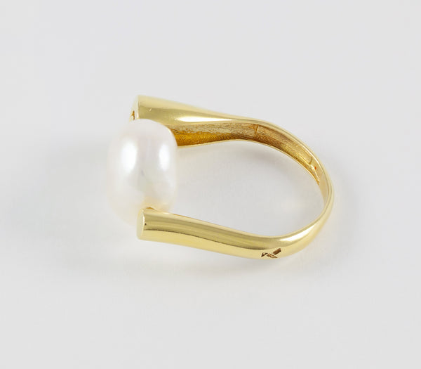 Anillo en oro amarillo 18k y perla