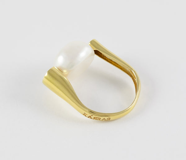 Anillo en oro amarillo 18k y perla