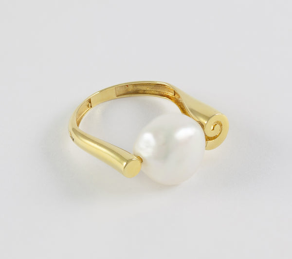 Anillo en oro amarillo 18k y perla