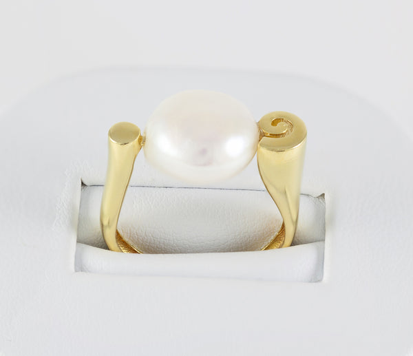 Anillo en oro amarillo 18k y perla