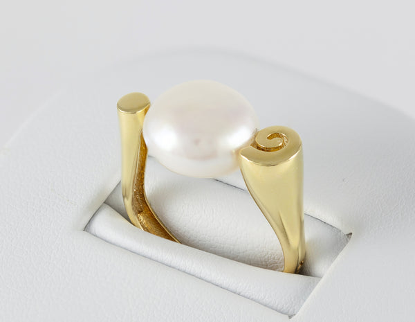 Anillo en oro amarillo 18k y perla