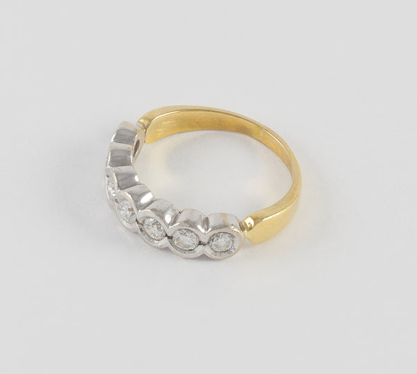 Anillo en oro blanco y amarillo 18k con brillantes