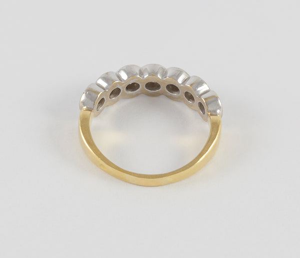 Anillo en oro blanco y amarillo 18k con brillantes