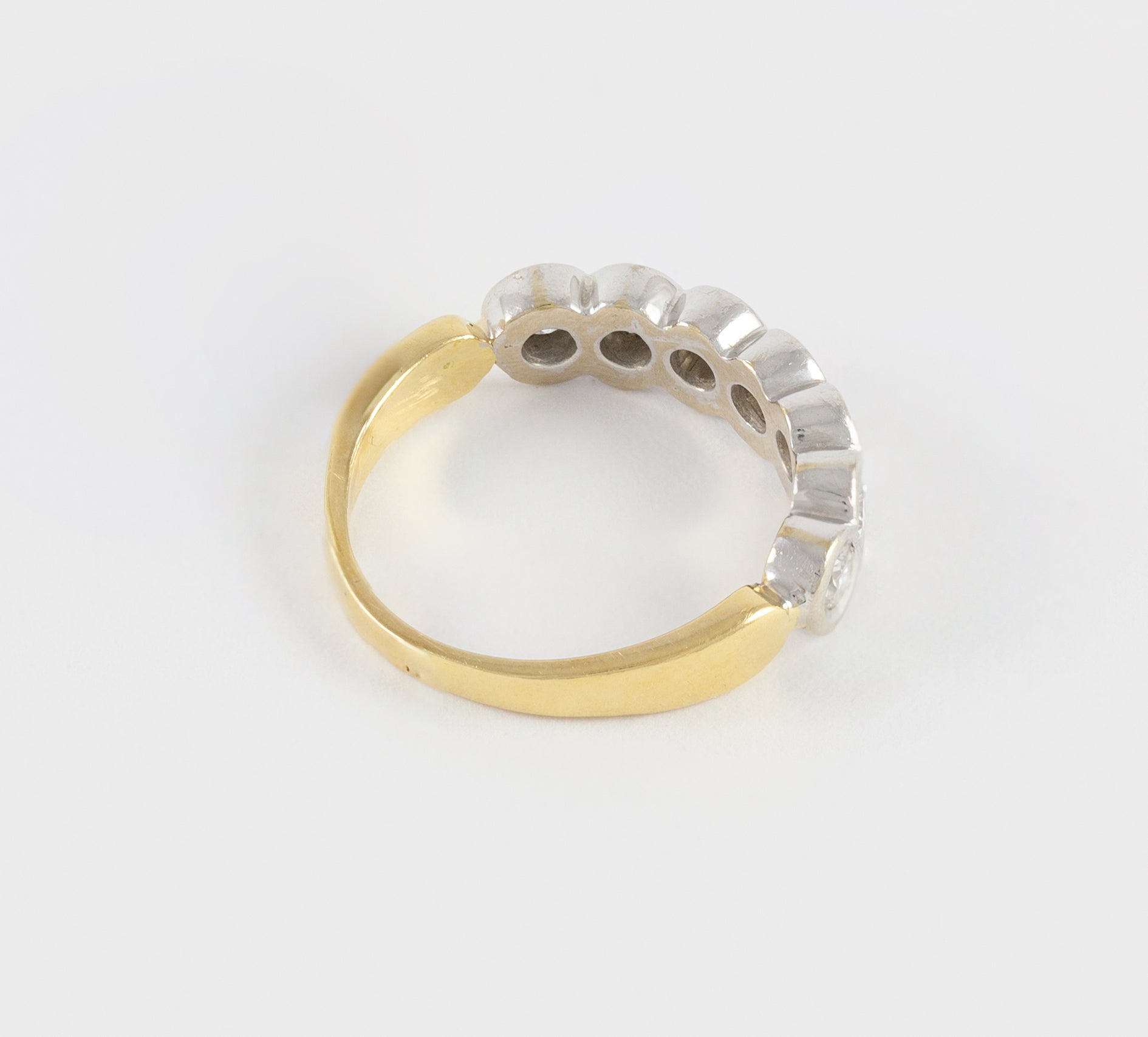 Anillo en oro blanco y amarillo 18k con brillantes