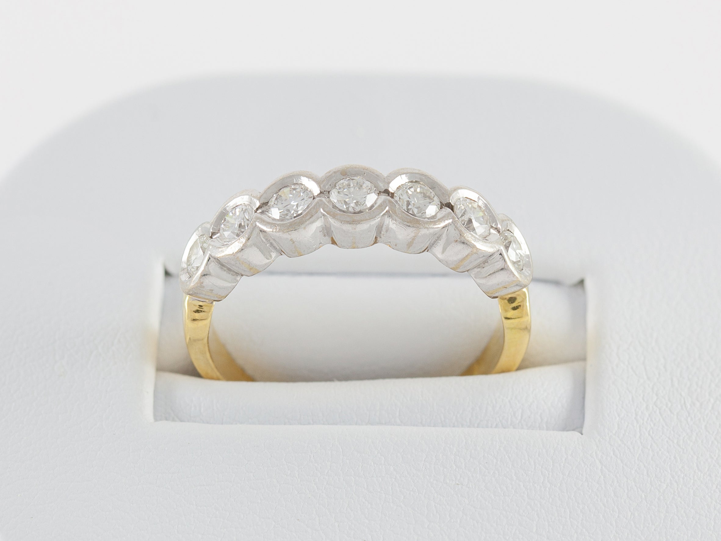 Anillo en oro blanco y amarillo 18k con brillantes
