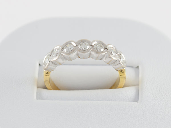 Anillo en oro blanco y amarillo 18k con brillantes