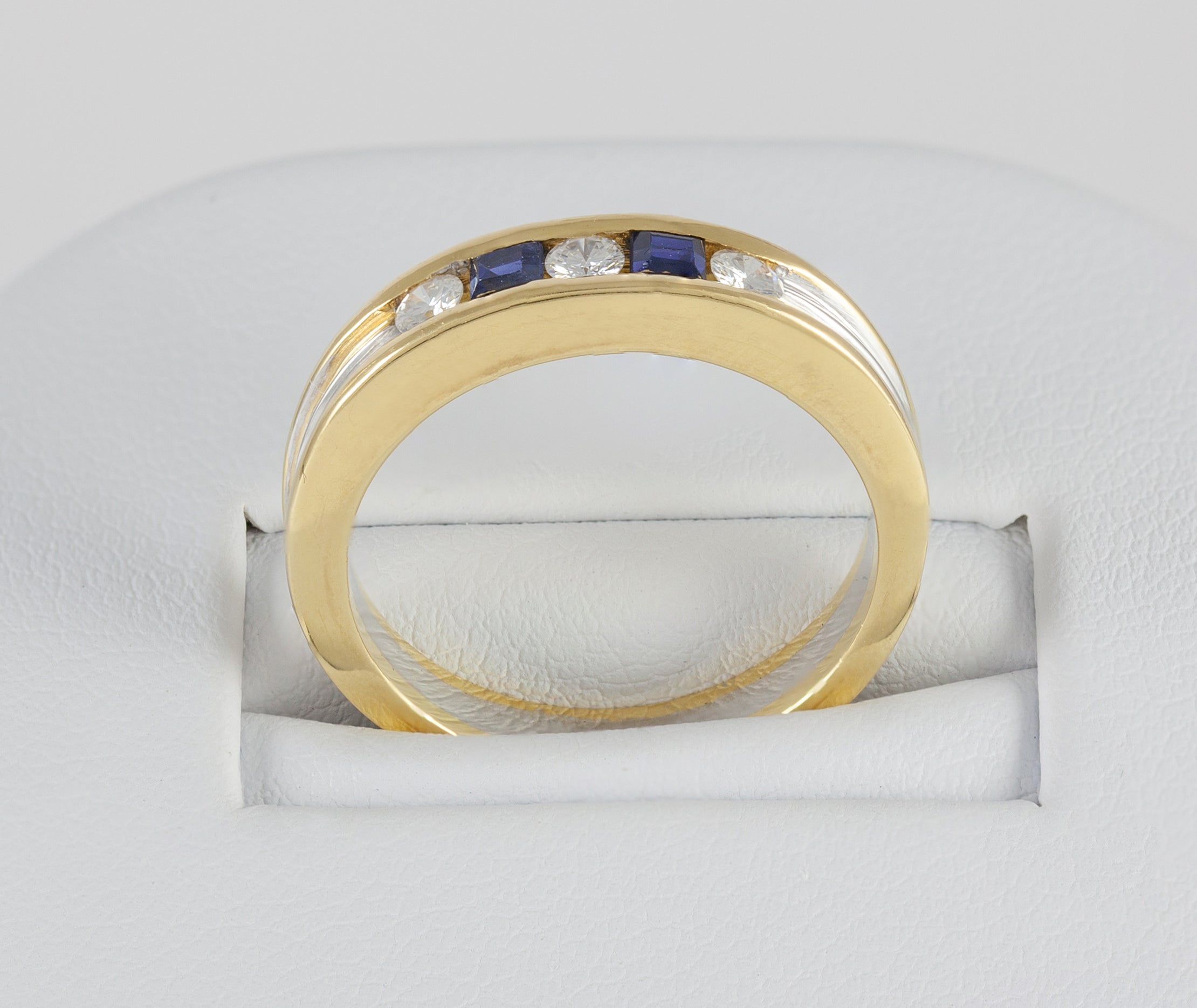 Anillo en oro blanco y amarillo 18k con brillantes y zafiros