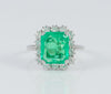 Anillo en oro blanco 18k con esmeralda 3.96 ct y diamantes