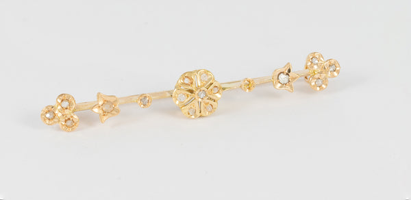 Broche antiguo en oro amarillo 18k y brillantes