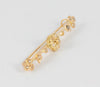 Broche antiguo en oro amarillo 18k y brillantes