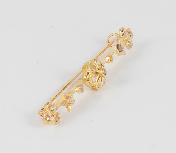 Broche antiguo en oro amarillo 18k y brillantes