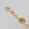 Broche antiguo en oro amarillo 18k y brillantes