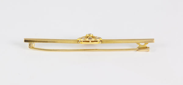 Broche antiguo en oro amarillo 18k y brillantes
