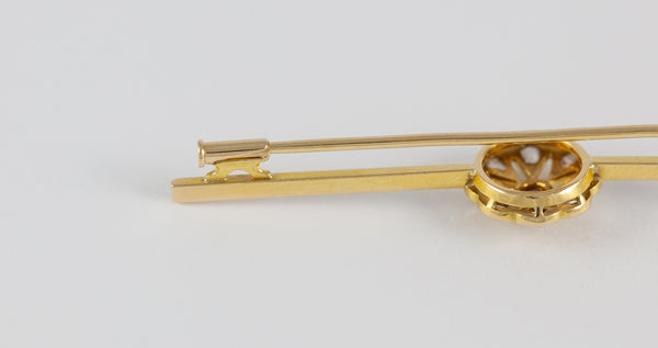 Broche antiguo en oro amarillo 18k y brillantes