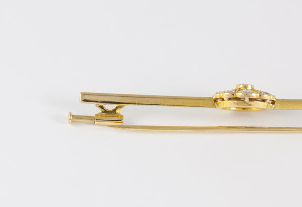 Broche antiguo en oro amarillo 18k y brillantes