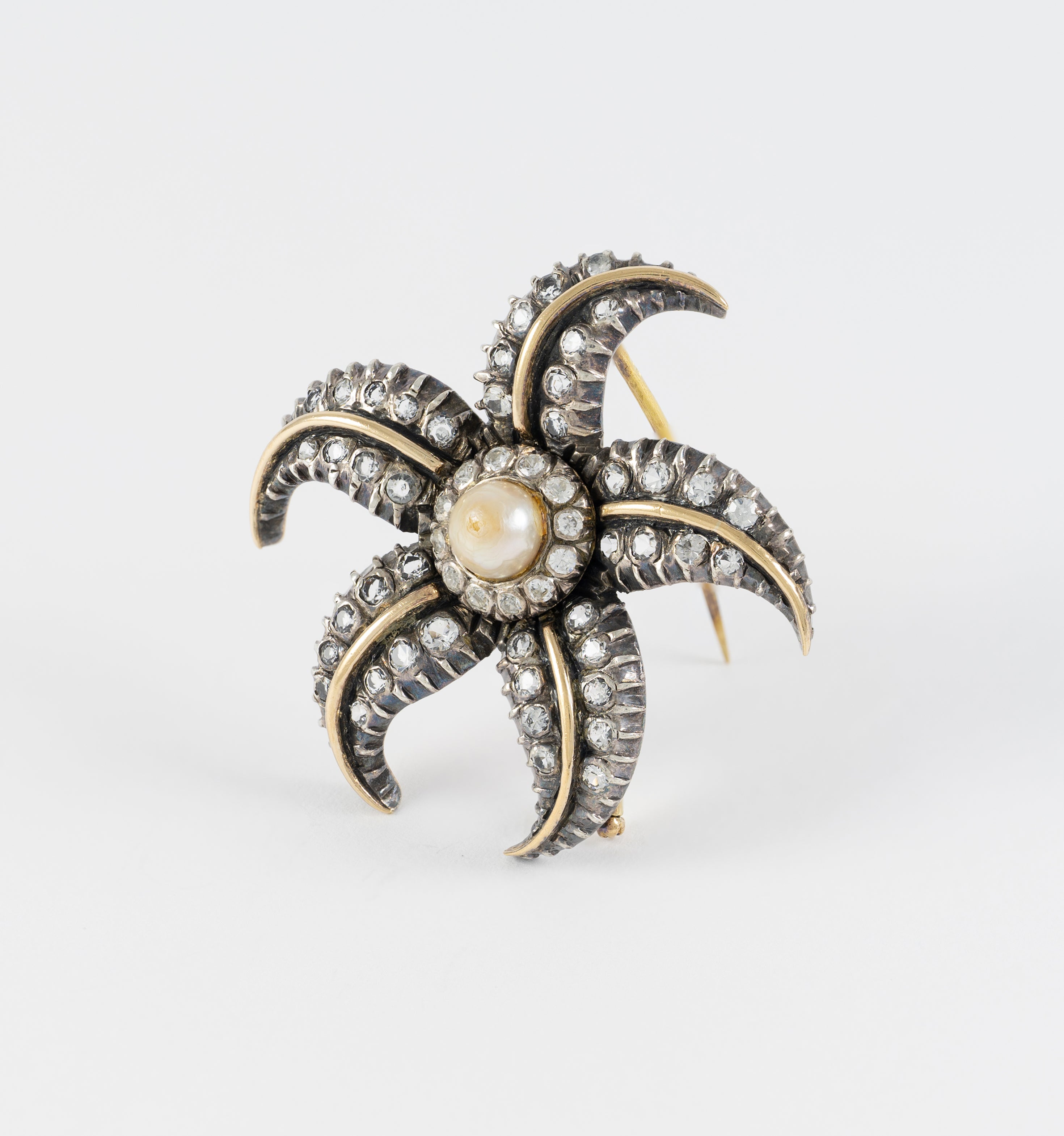 Broche antiguo en oro amarillo 18k y plata