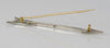 Broche flecha en oro blanco 18k con brillantes y esmeraldas