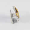 Broche en oro blanco y amarillo 18k con diamantes, rubíes y esmaltado