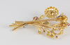 Broche antiguo en oro amarillo 18k con brillantes, amatistas y esmeraldas