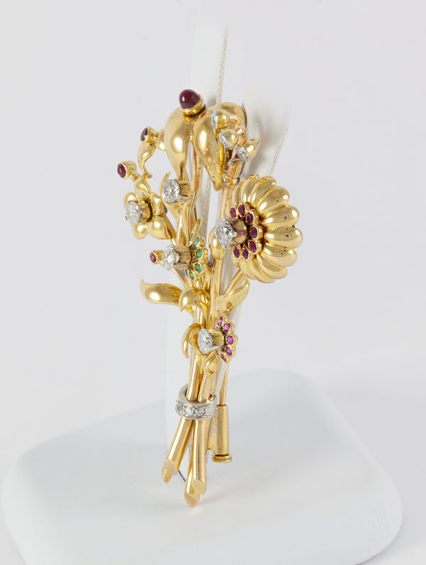 Broche antiguo en oro amarillo 18k con brillantes, amatistas y esmeraldas
