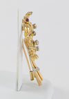 Broche antiguo en oro amarillo 18k con brillantes, amatistas y esmeraldas