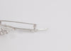 Broche flor en oro blanco 18k con brillantes