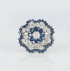 Broche en oro blanco 18k con diamantes 4.56 ct y zafiros 7.84 ct