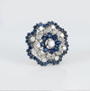 Broche en oro blanco 18k con diamantes 4.56 ct y zafiros 7.84 ct
