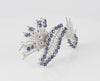 Broche vintage en oro blanco 18k con zafiros y brillantes