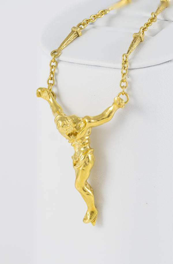 Cadena de clavos y cristo de Dalí en oro amarillo 18k